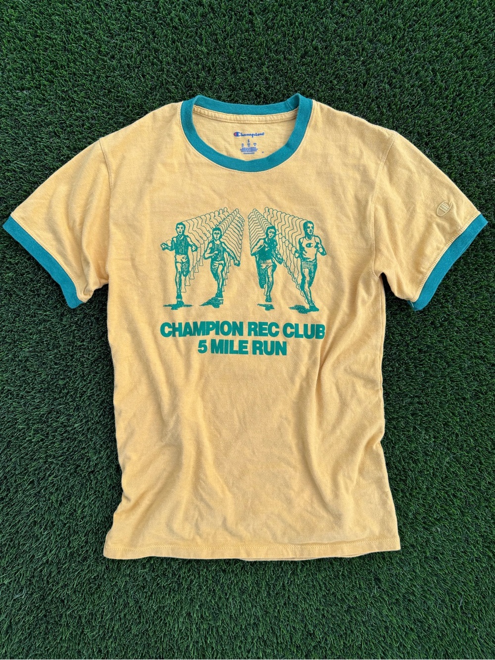 Champion Yellow Tee with Teal Trim and Teal Graphic